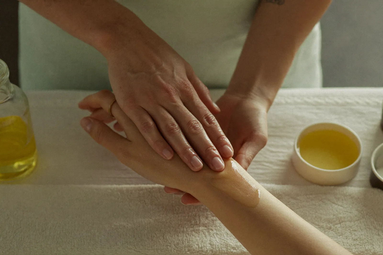 Relaxing hand massage in a private treatment room