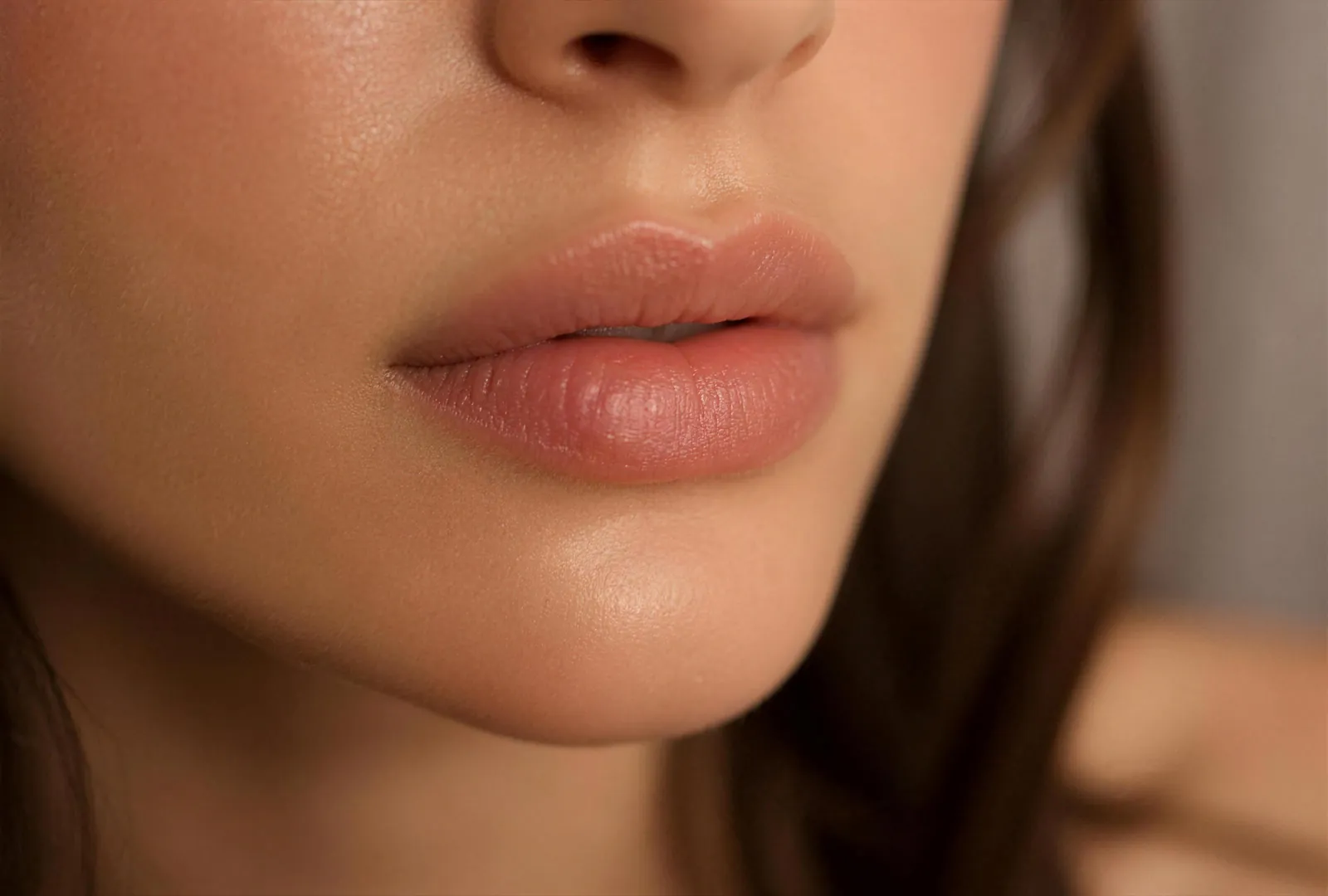 Soft natural lip close-up — illustrative only